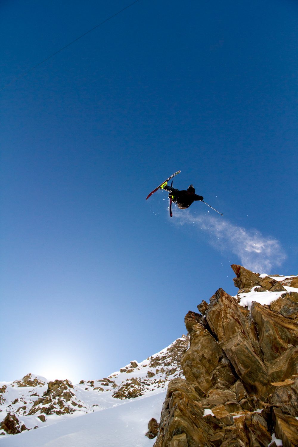 Jacob Webstier skis off a cliff - photo by Ethan Stone at Courmayeur