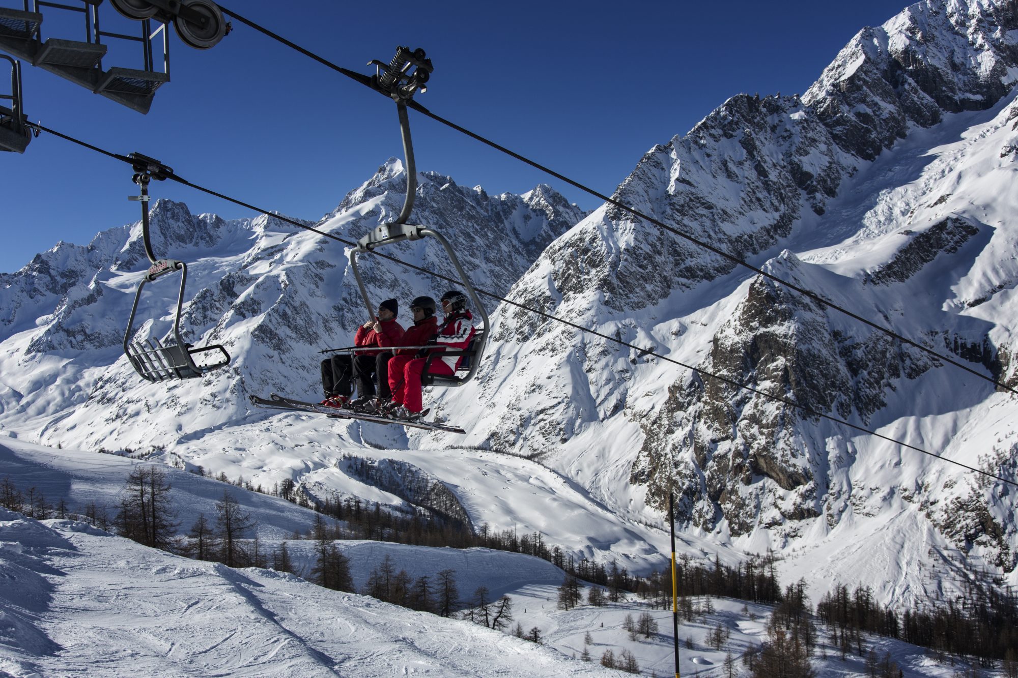 Chairlift ride up in Courmayeur Mont Blanc. Courmayeur Mont Blanc Funivie is opening two new slopes with amazing panoramic views. 