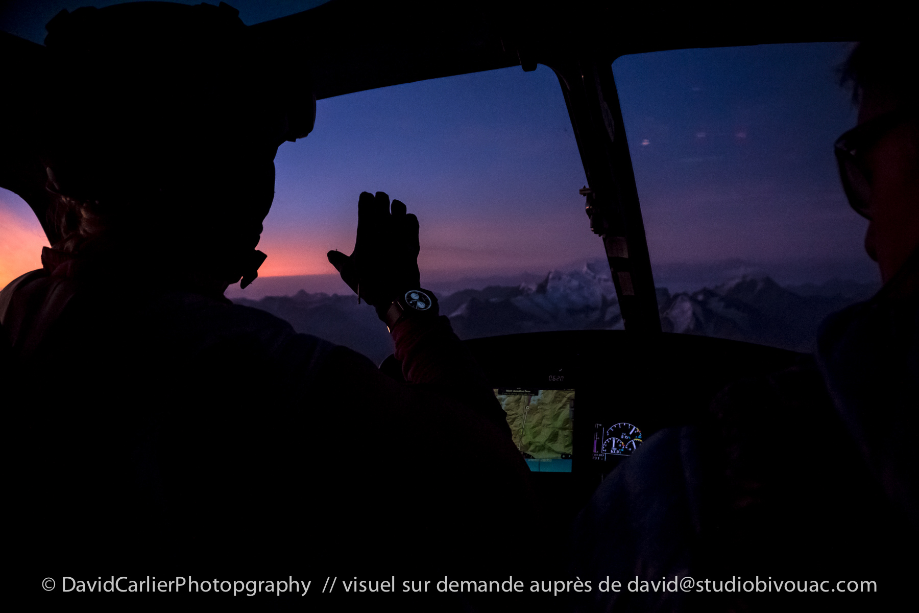 Géraldine Fasnacht on her way to her night flight on her wingsuit over the Alps - photo by David Carlier