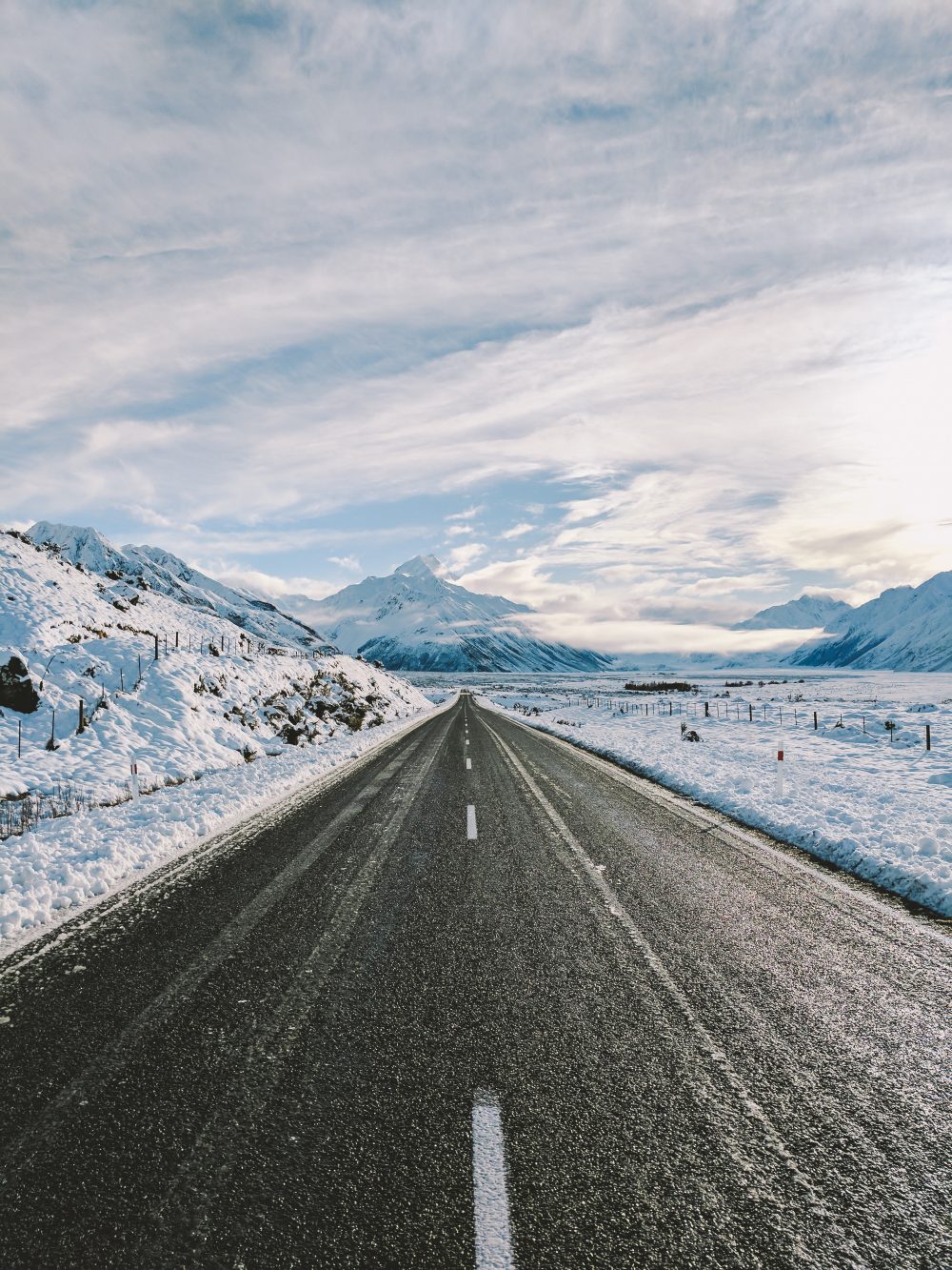 Driving to the mountains. Photo: Samuel Scrimshaw. Unsplash. So, you want to take your family skiing, but you do not know where to start?