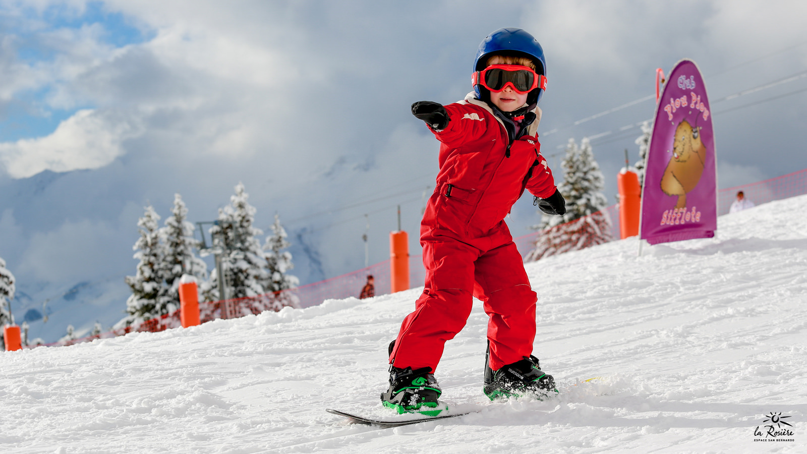 A kid on snowboard school at La Rosiere