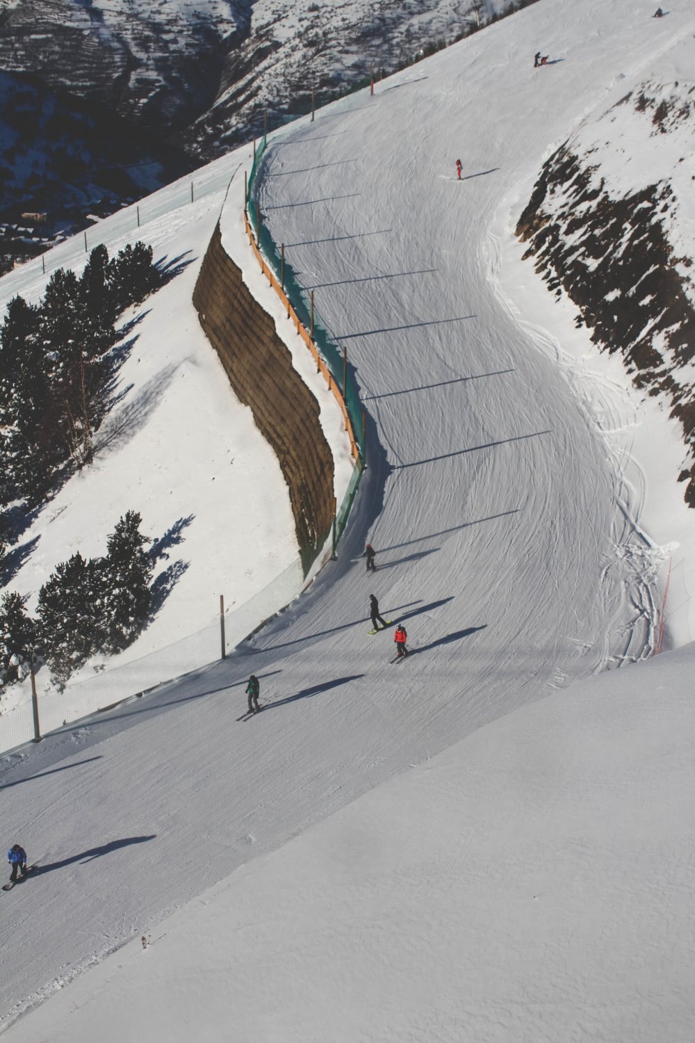 Ski Run - photo by Toa Heftiba - Unsplash. Driving to the mountains.