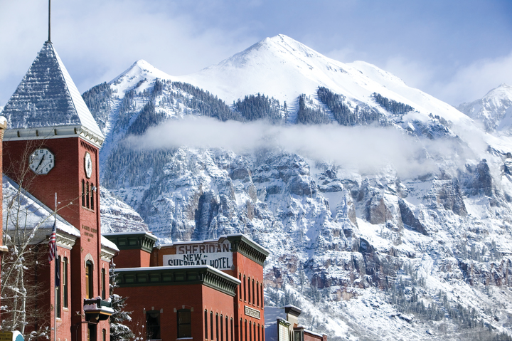 The town of Telluride, a classic picture with the Sheridan hotel and the beautiful San Juan Mountains in the backdrop - picture by Telluride ski resort.