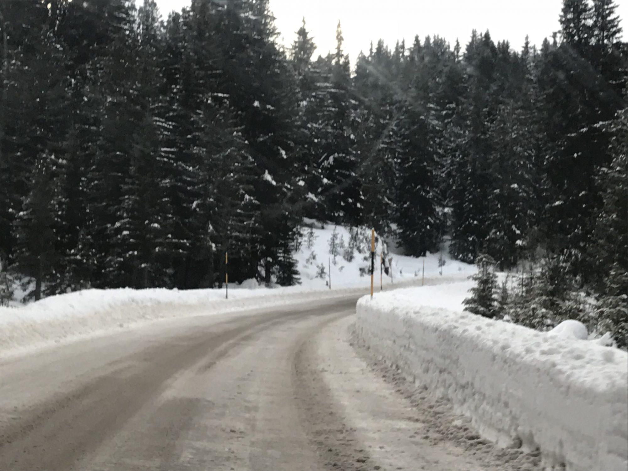 Snowy road at Passo Lavaze in Val di Fiemme, Trentino/Sud Tirol. Photo: The-Ski-Guru. Skiers Over New Year Prepare for a £450 Wipeout at the Car Hire Rental Desk.