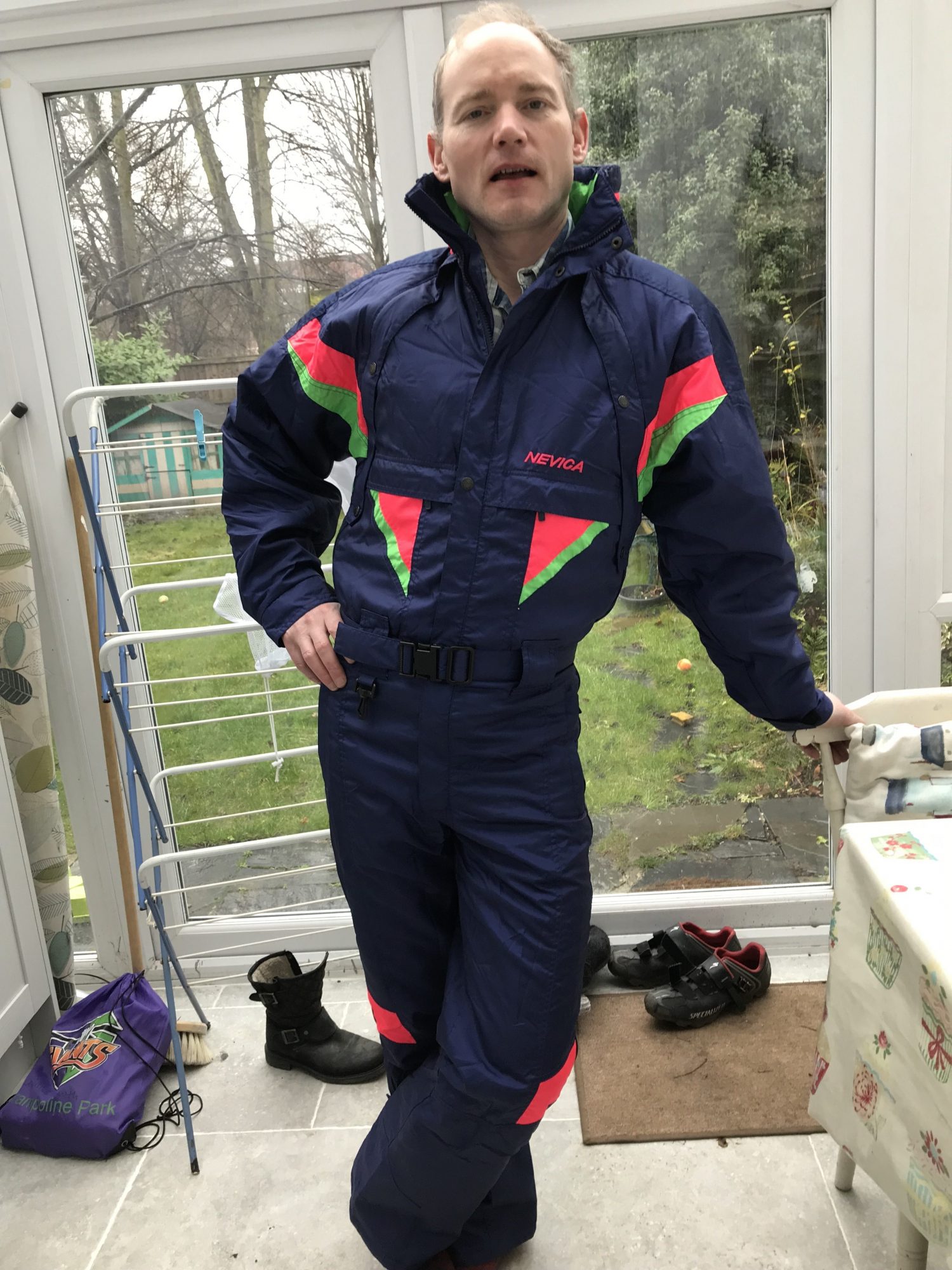 My husband models my sister's old Nevica one piece suit of 1987. Photo by The-Ski-Guru