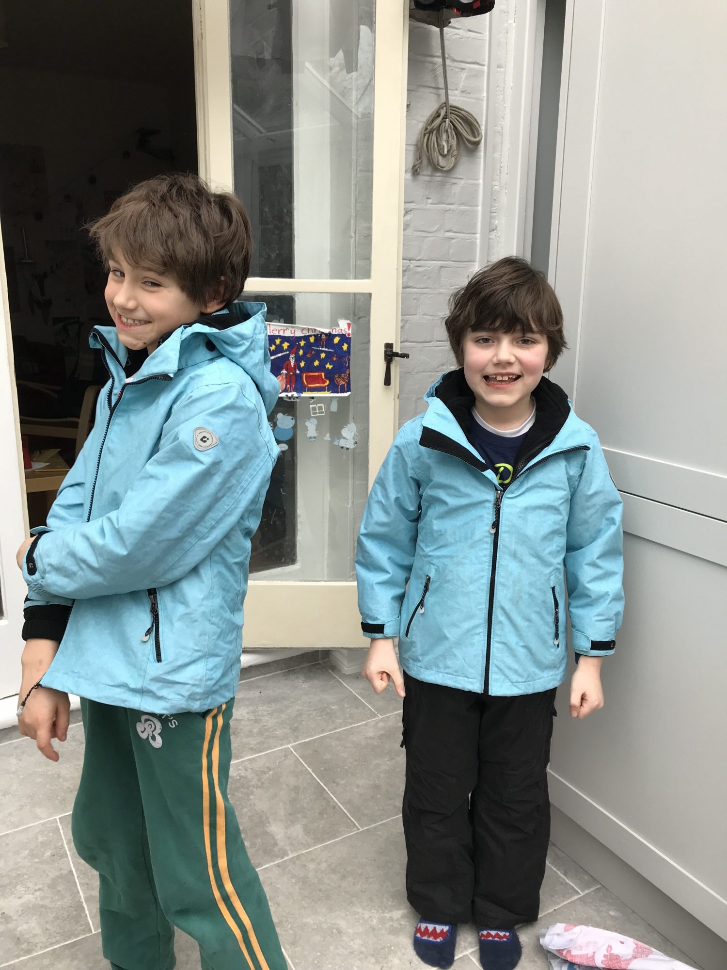 The boys model their jackets - bought four years ago in Munich - they have been a winner!