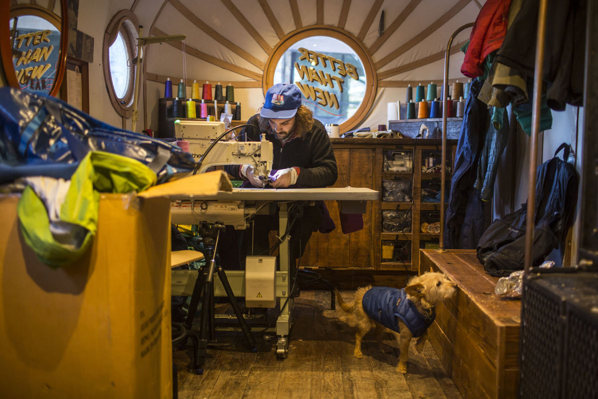 Patagonia van goes around all ski resorts repairing Patagonia kit and explaining how to do it yourself. 