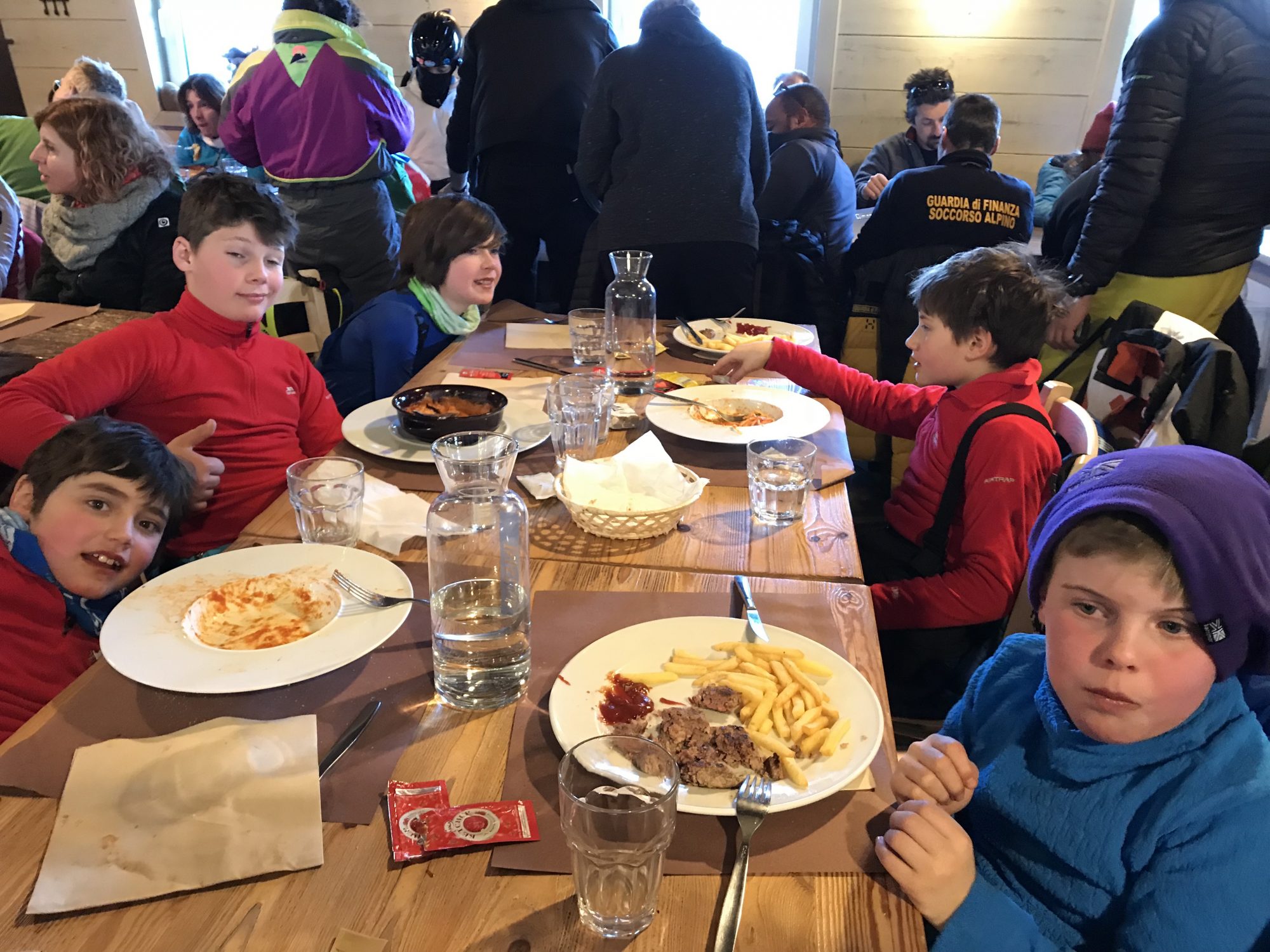 The boys at Trattoria dei Maestri by the Scuola Sci Pila in Pilla 2000.