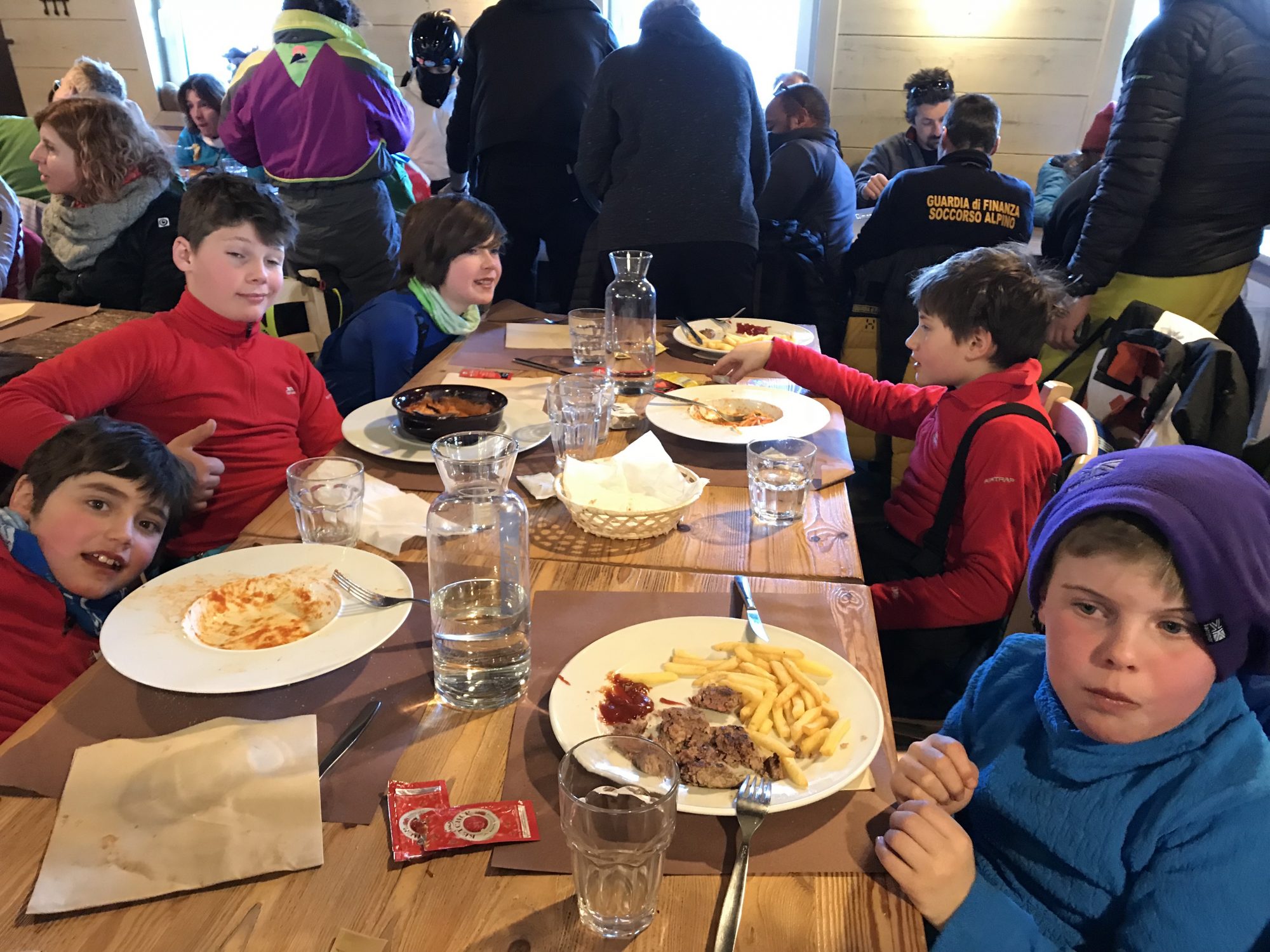 The boys at Trattoria dei Maestri by the Scuola Sci Pila in Pilla 2000. 