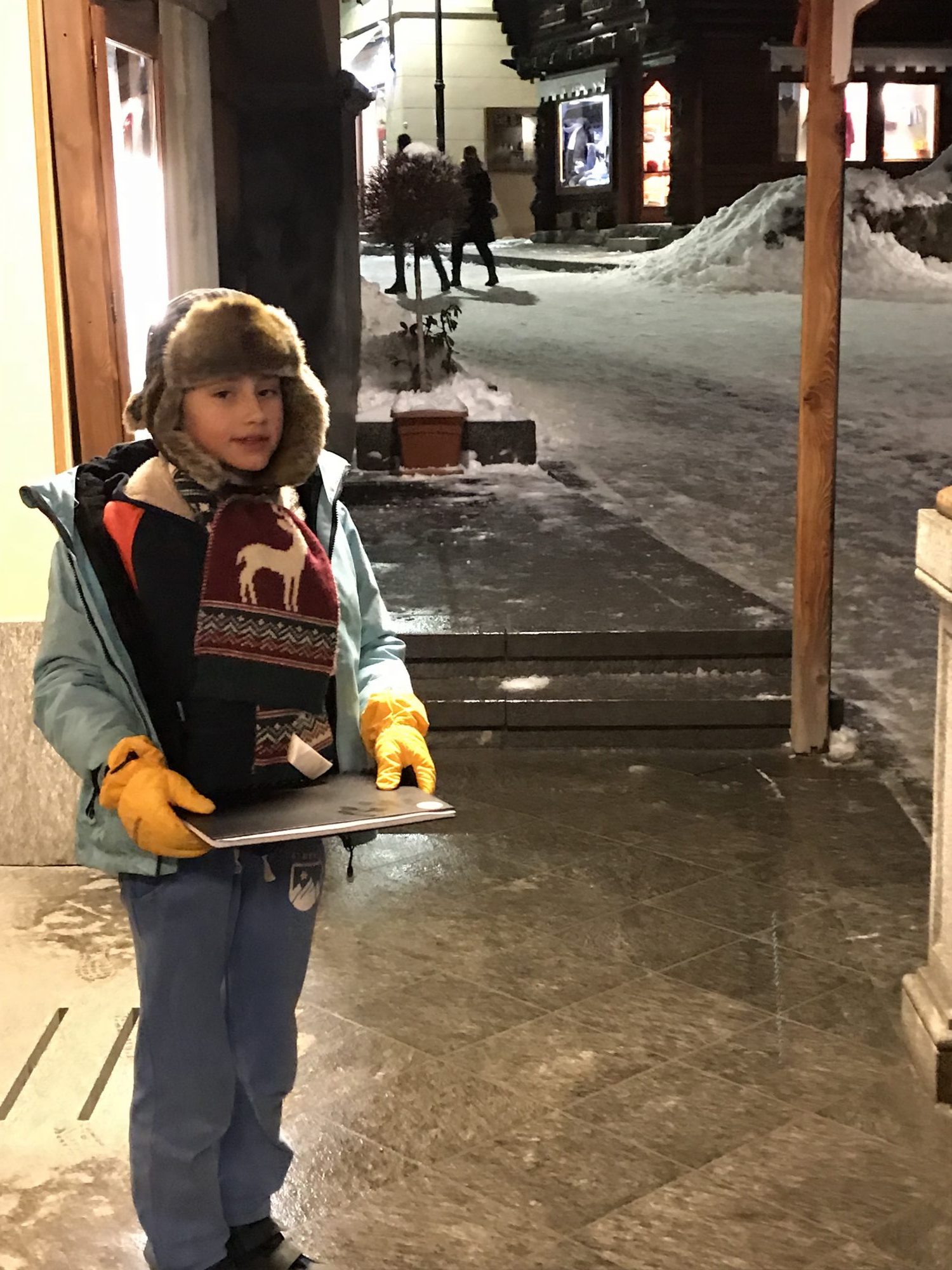 Lawrence in Via Roma going to Mont Frety restaurant. Photo by The-Ski-Guru.
