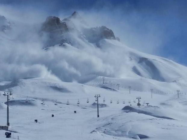 Controlled avalanche in Las Leñas on the Vulcano canyon. High prone avalanche terrain