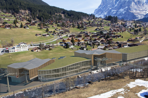 Photomontage of the possible new situation in the ground in Grindelwald. Left the new Männlichenbahn, right the Eiger Express and the parking garage. Both planned new buildings are marketed under the name V project