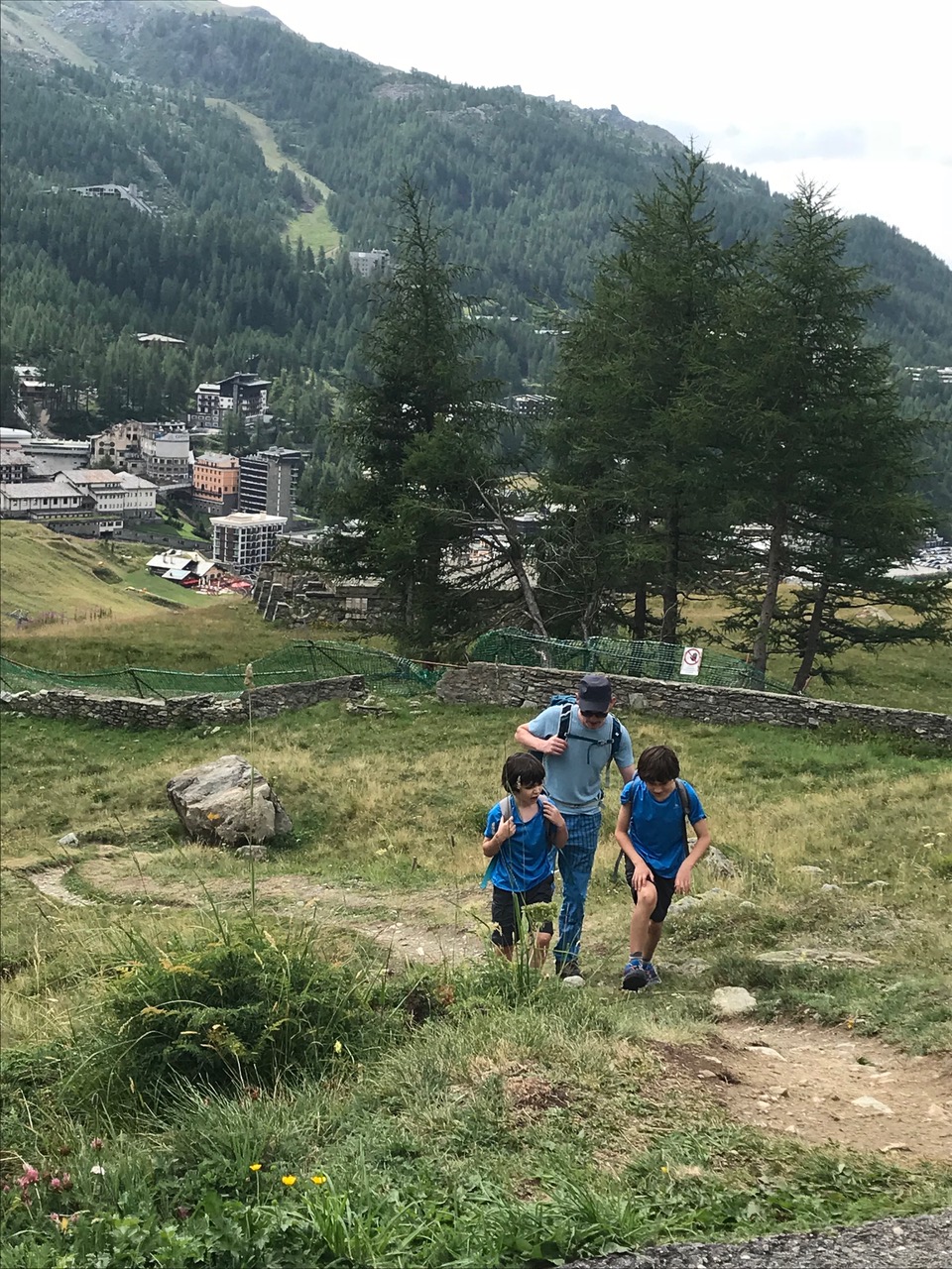 Starting the ascent to the face of the Monte Cervino. Chris and the boys coming up as goats. 