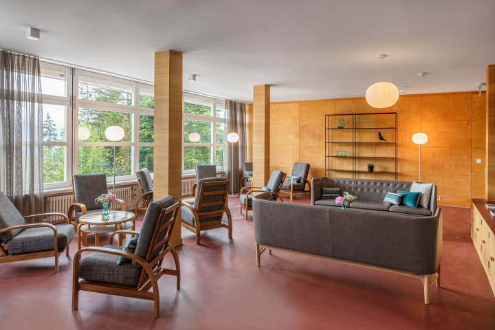 Living room area in the Youth Hostel in Crans-Montana. 