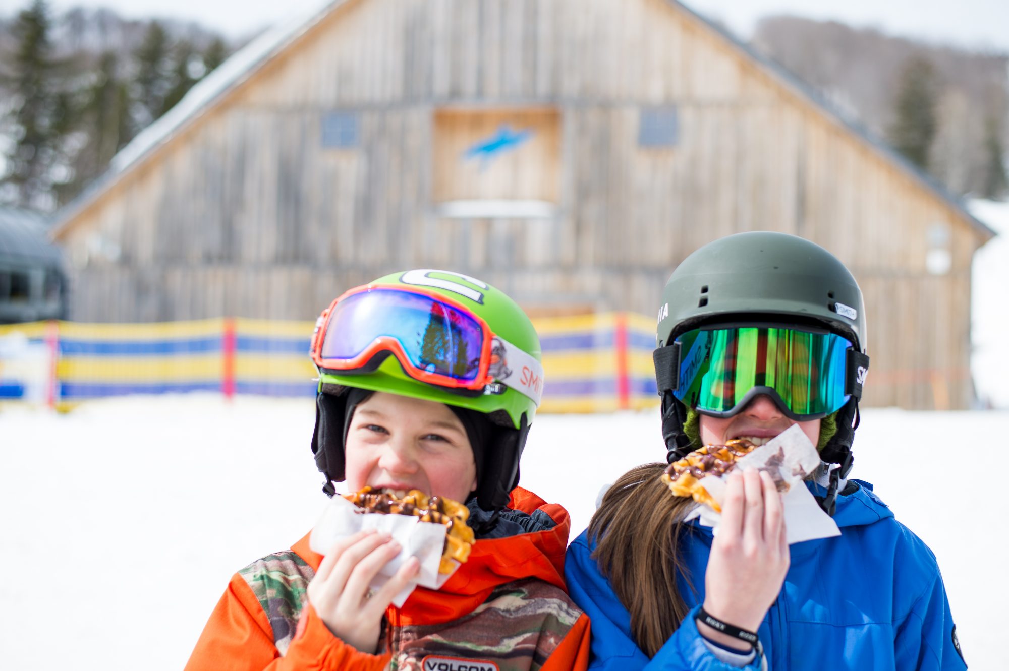 Kids enjoy their lunch at Mount Snow, VT. Peak Resorts.