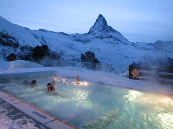 Heated outside pool at the Riffelalp Resort with a view. 