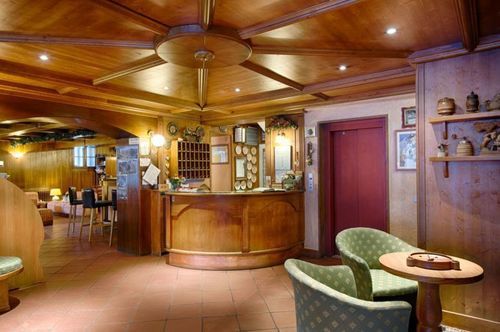 Reception area and bar at Hotel Edelweiss-Courmayeur. Where to stay in Courmayeur.