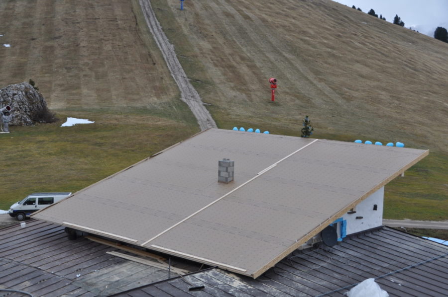 A view from the roof fixed in record time for the opening of the season - Rifugio Comici- Selva di Val Gardena. Sudtirol. 