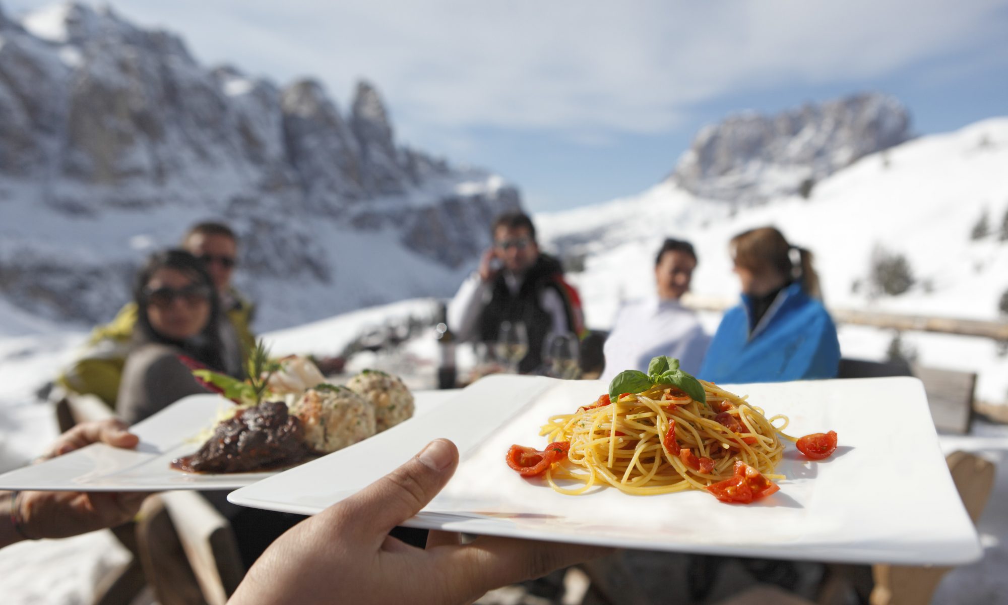 The Alpine huts along the ski slopes of the Gardena Valley serve local fare mixing traditional Italian with South Tyrolean dishes; against the magnificent background of the snow-capped peaks of the Sella Mountain Group in the Dolomites. Photo: IDM Sudtirol - The roof of the Rifugio Comici in Selva Val Gardena was restored in record time. Photo: IDM Sudtirol - The roof of the Rifugio Comici in Selva Val Gardena was restored in record time.