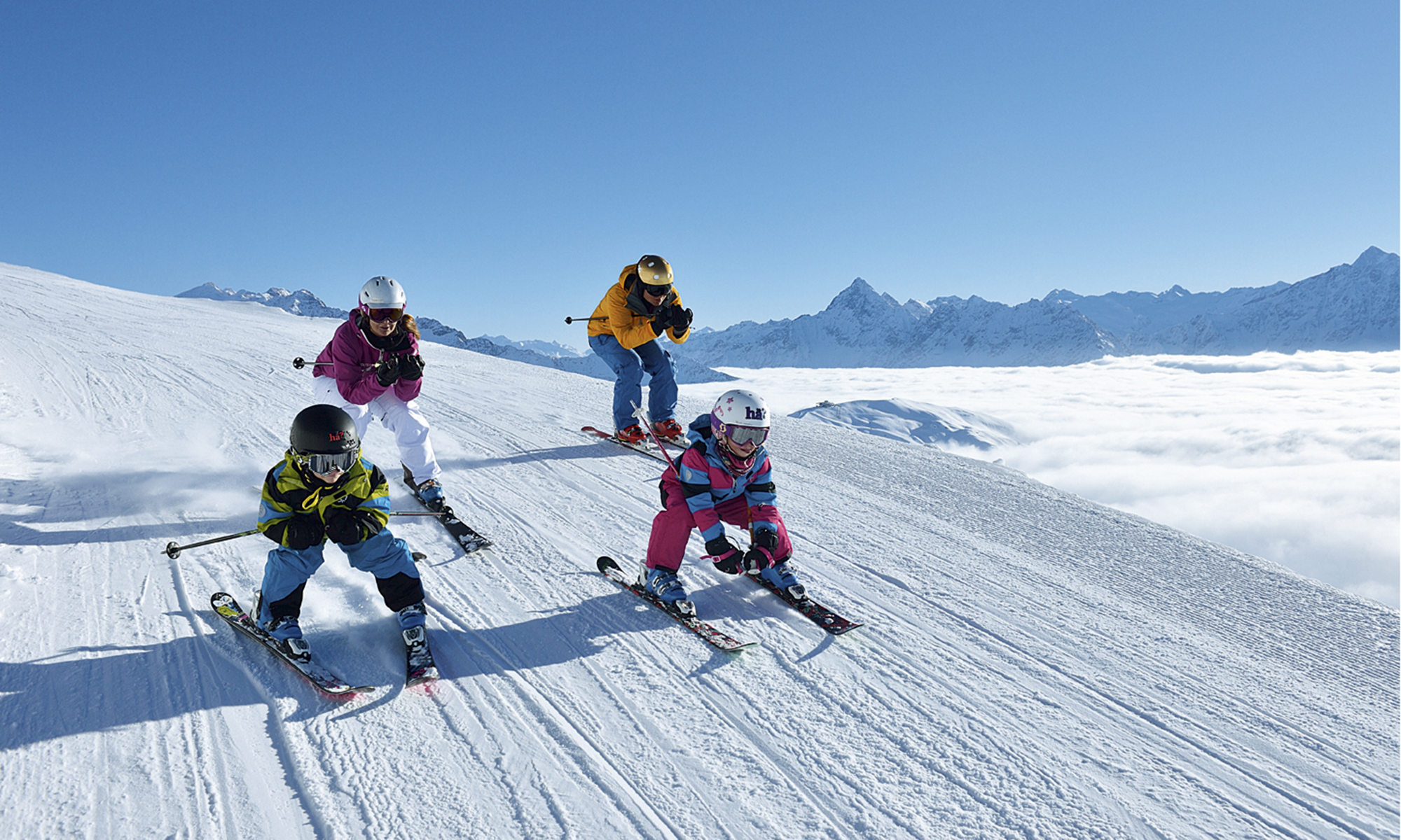 Switzerland. get natural. Skiing fun for the whole family in the ski resort of Meiringen-Hasliberg in the Bernese Oberland. Above the sea of fog in brilliant winter sunshine, the area provides an opportunity for various winter sports activities. Switzerland is giving away 12,770 ski passes for kids. Copyright by: Switzerland Tourism - By-Line: swiss-image.ch/Christian Perret