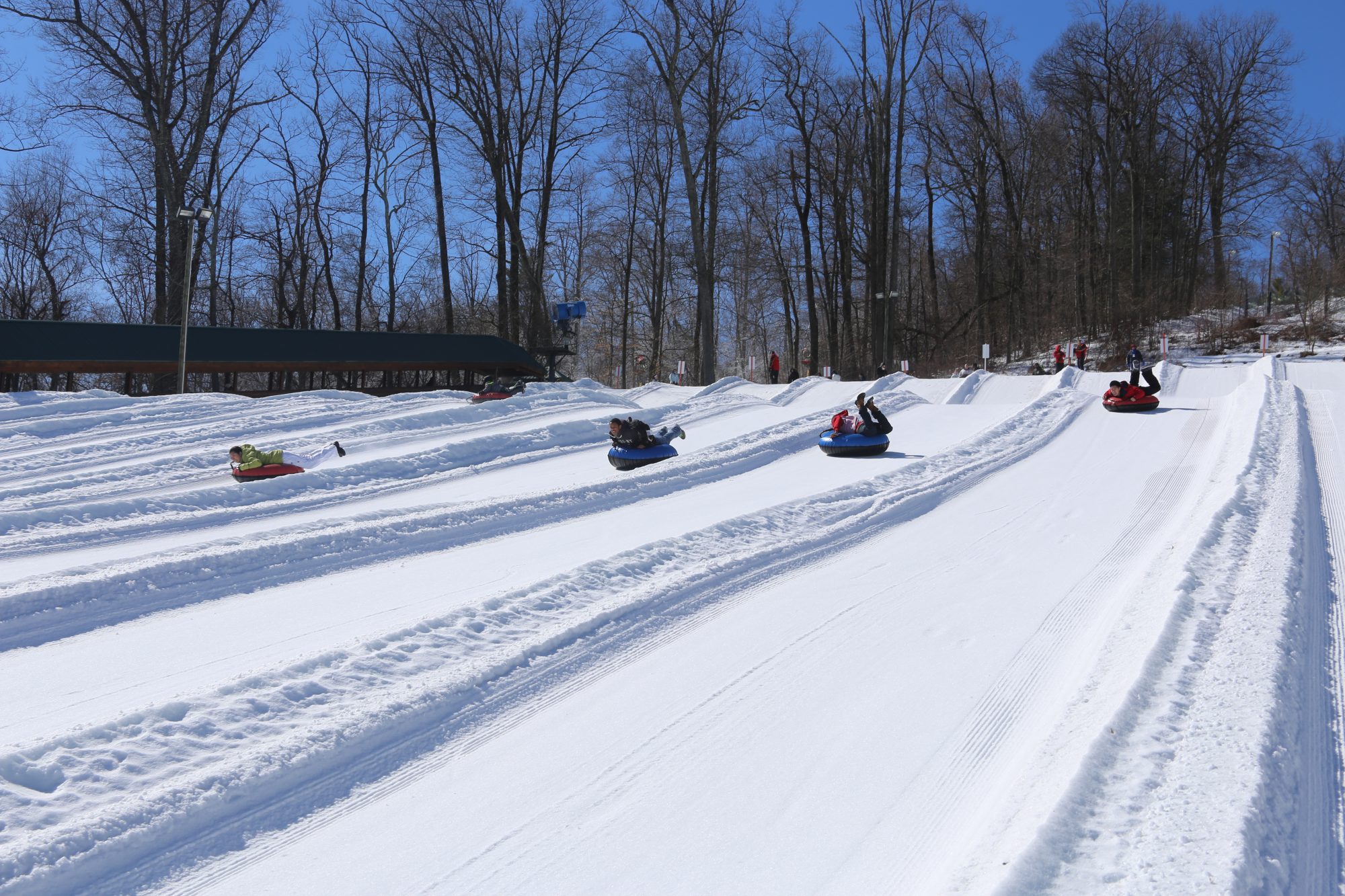 Tubing down the slopes. Peak Resorts Completes Acquisition of Snow Time. Peak Resorts photo.
