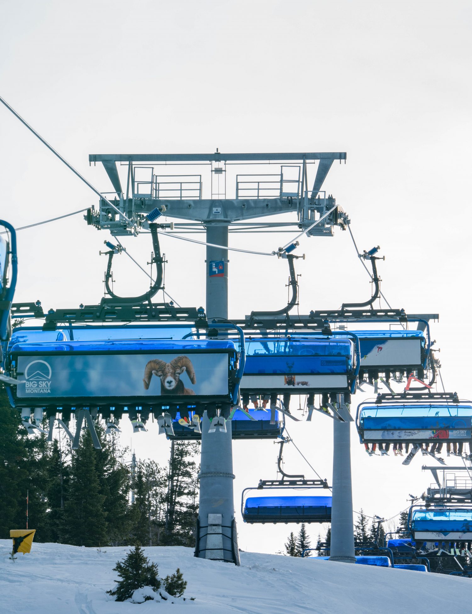 Ed Coyle photo. Big Sky Montana photo. An eight-people high speed lift in Big Sky. The Ramcharger. Different types of lifts on resorts (I can think of) and how to ride them.
