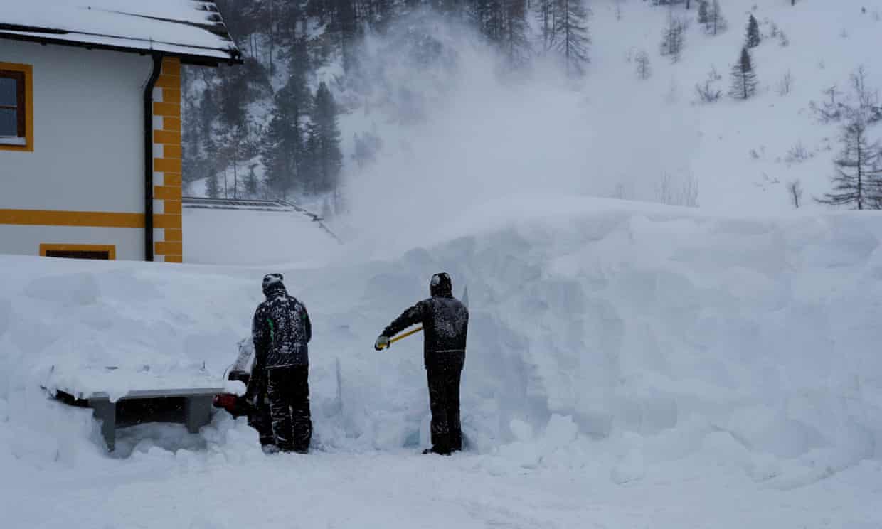 Workers clearing snow in the Austrian resort of Obertauern. Austria got hit by lots of snow this past week. Three German Skiers got killed in an Avalanche near the Austrian resort of Lech, fourth is missing.