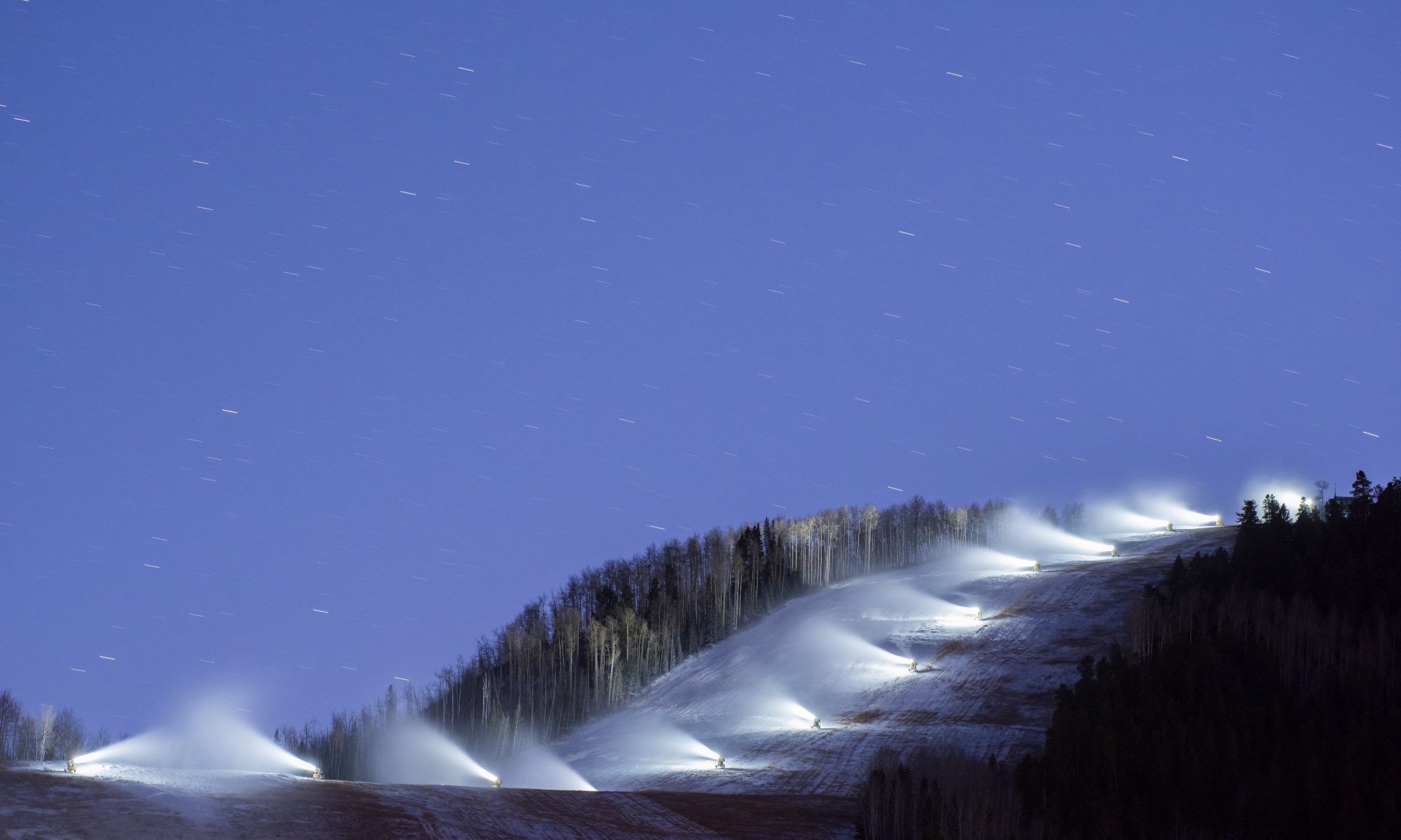 Snowmaking. Photo: Aspen Skiing Company. ASPEN SKIING COMPANY RELEASES 2018 SUSTAINABILITY REPORT In the style of Stan Lee.