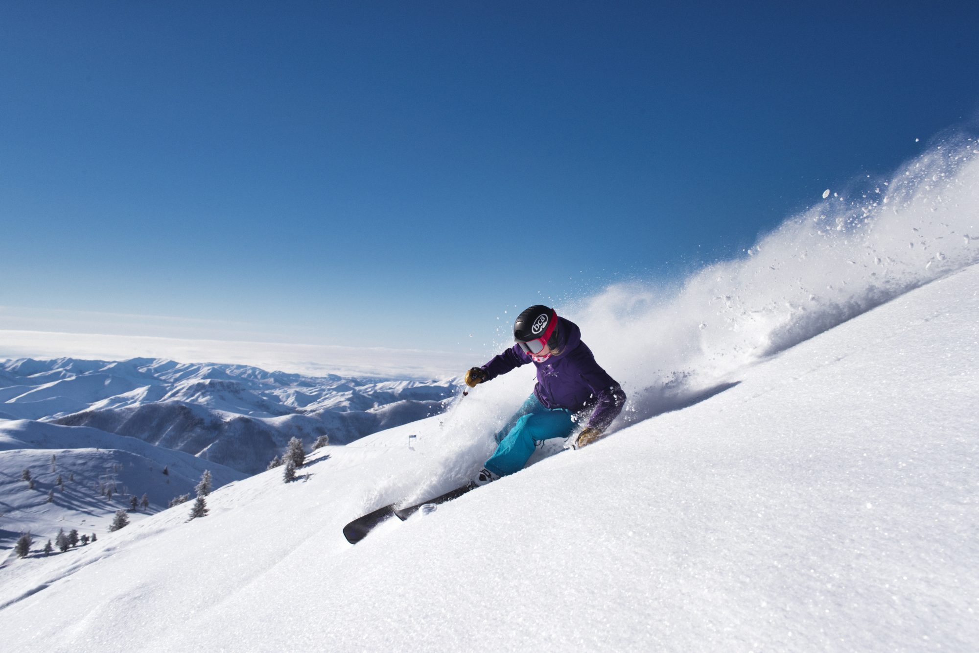 Photo Caption: Bluebird powder day skiing on Bald Mountain. Sun Valley and Snowbasin Join the Epic Pass.