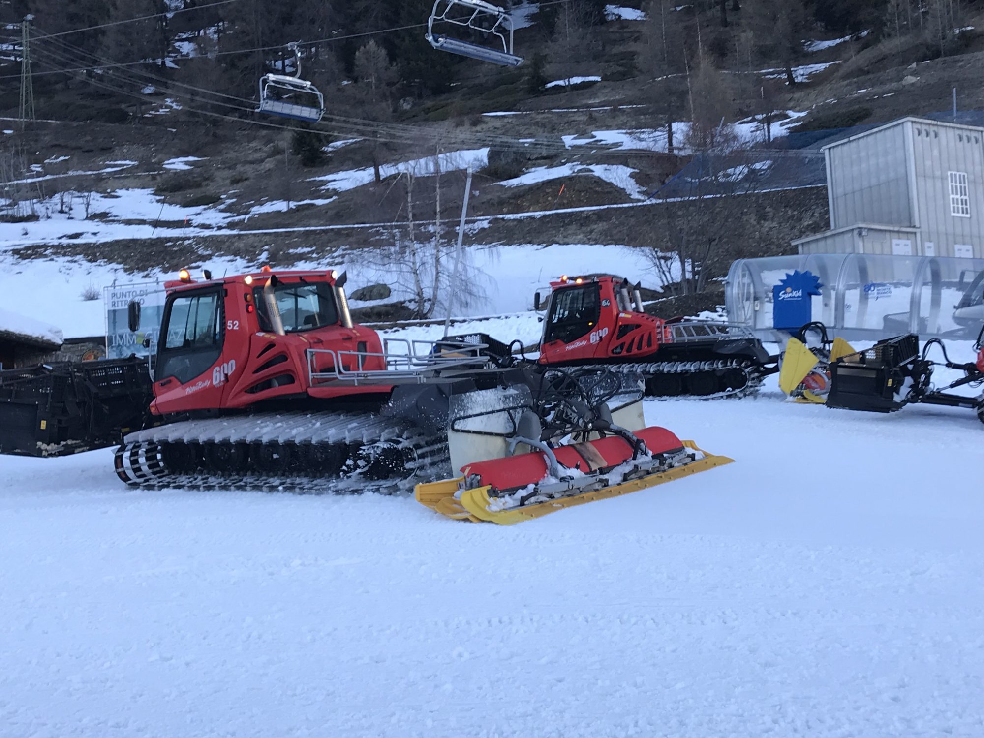 Snow groomers getting ready to work on the slopes of Courmayeur. Photo: The-Ski-Guru. How ski grooming patterns can affect visibility in the snow. 