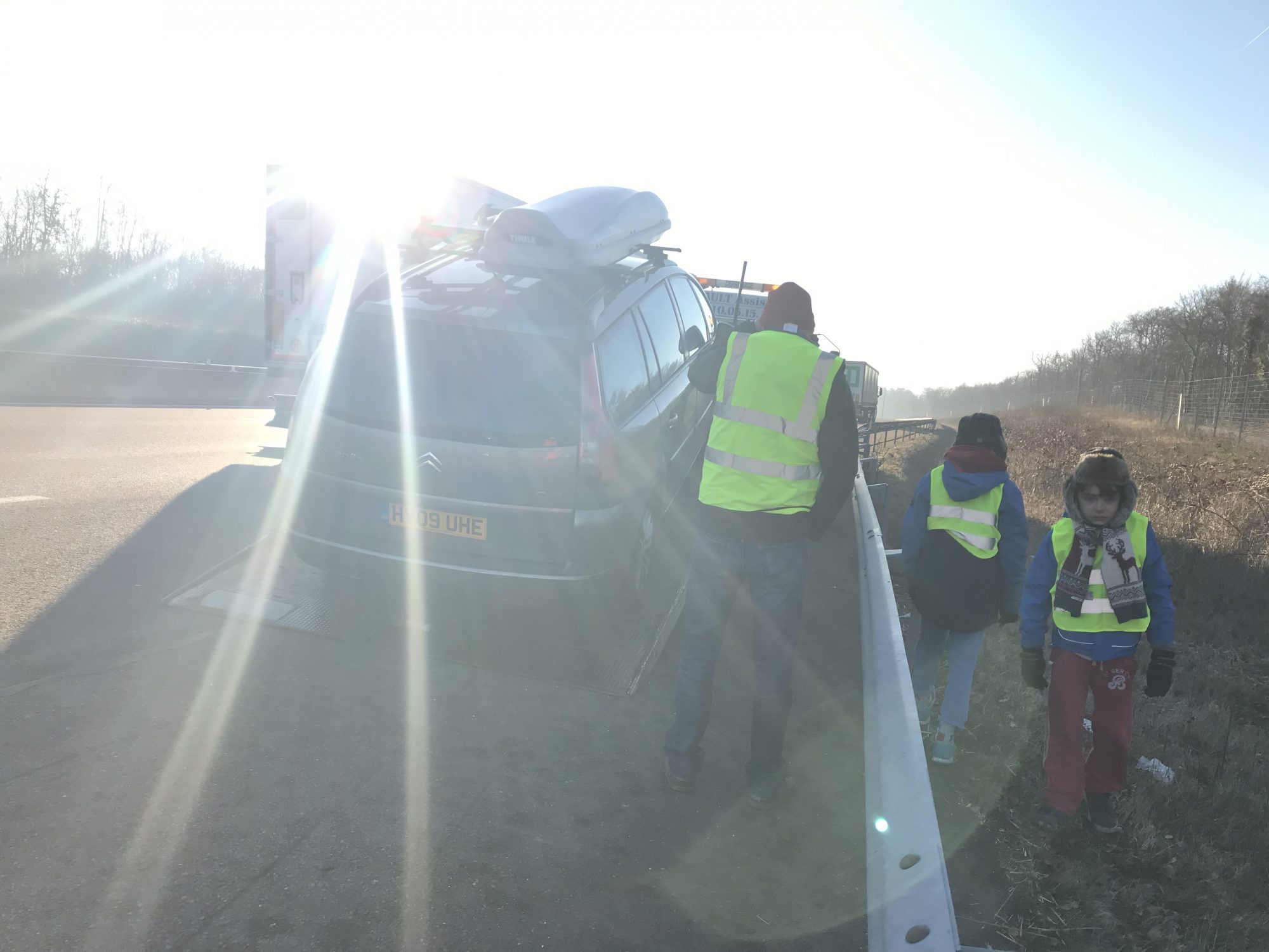 The car is taken off the autoroute to the mechanic house - Saturday morning, still early hours. Photo: The-Ski-Guru. The Half Term Family Ski Holiday that did not result as planned.