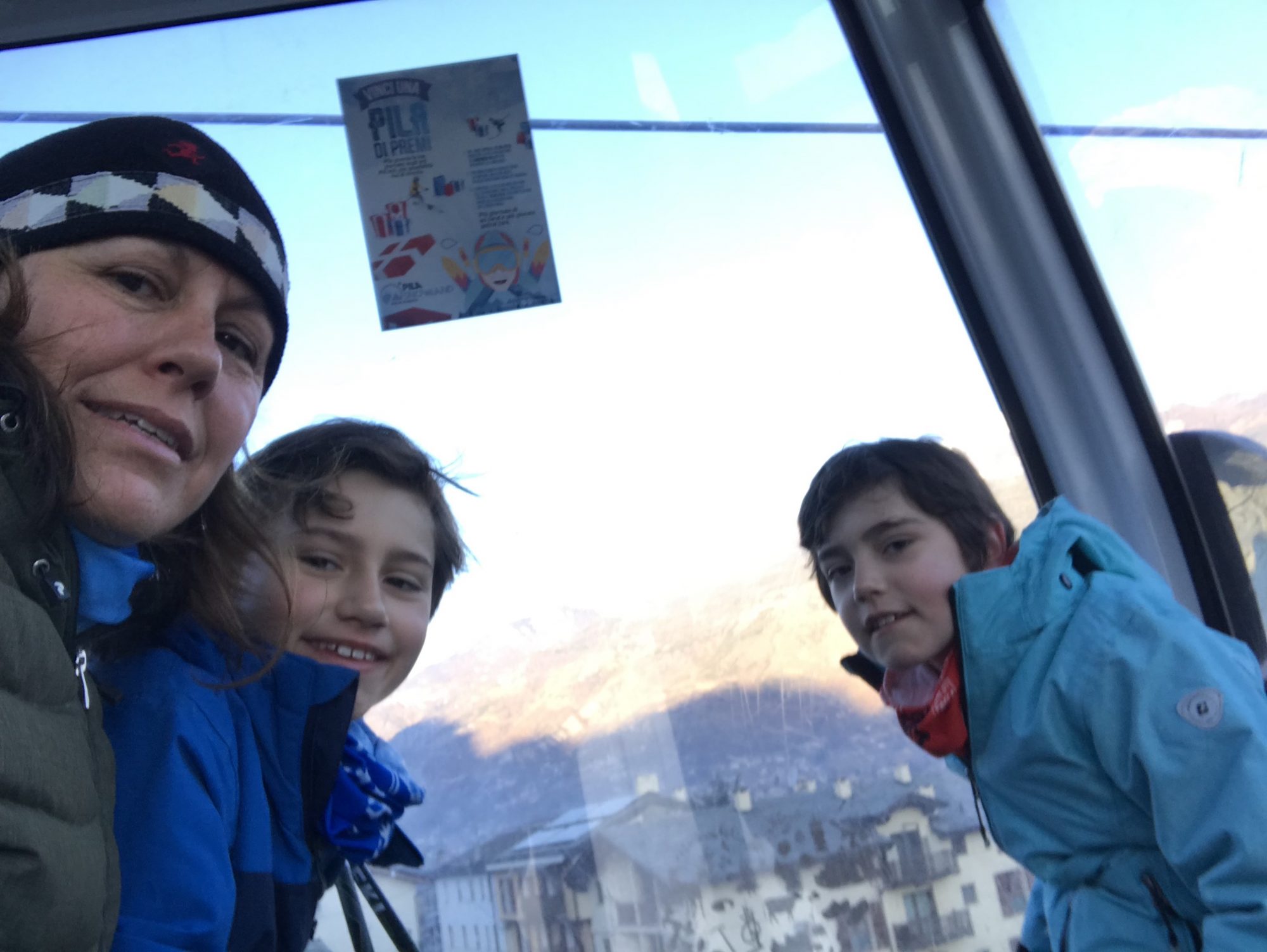 Going up the Aosta-Pila gondola with my boys - not sure if my knee was going to perform. Photo: The-Ski-Guru. The Half Term Family Ski Holiday that did not result as planned.