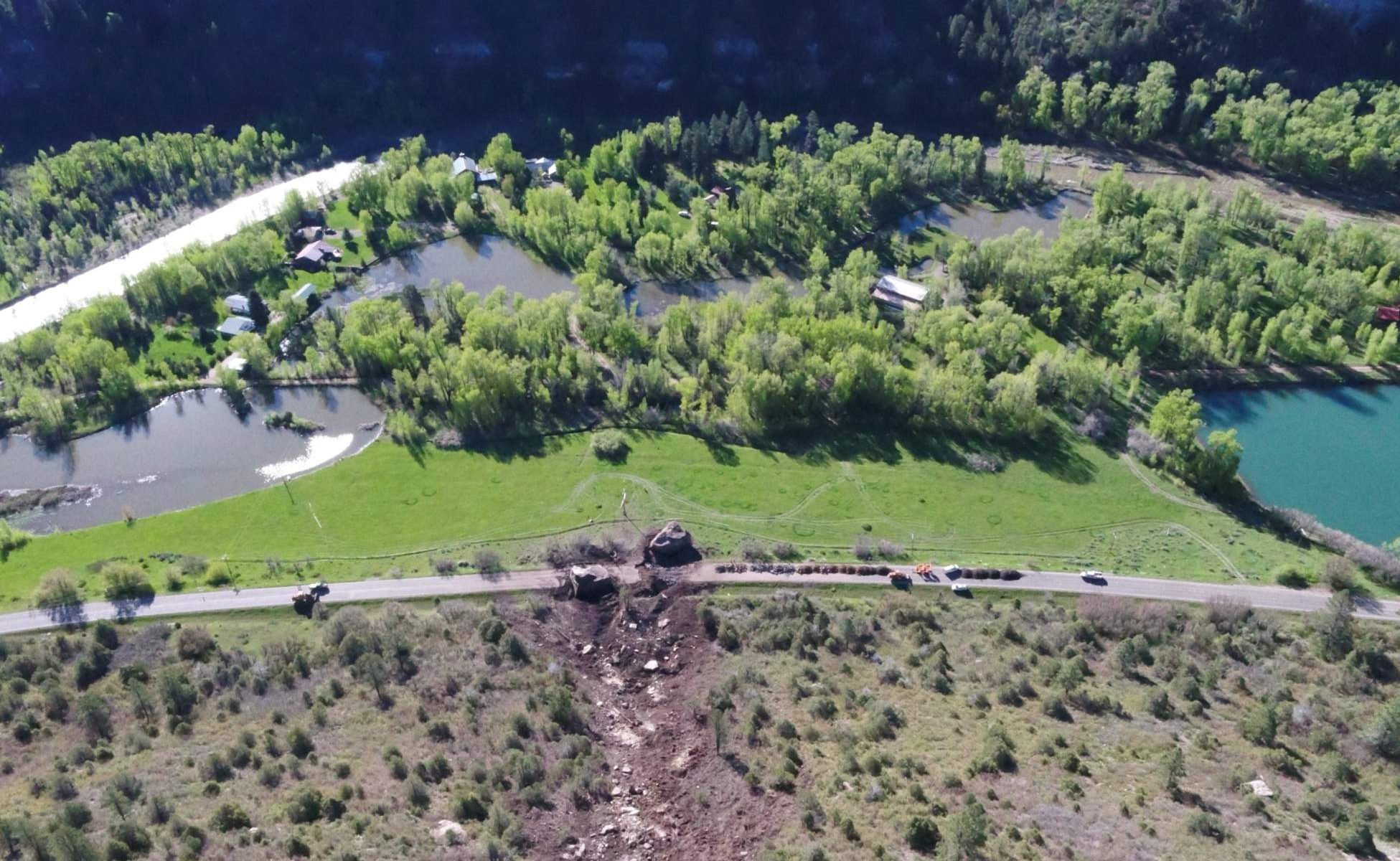 An aerial image of the road obstruction. Photo: CDOT. A Rockslide, with a boulder of a size of a house, wiped out a section of the highway in SW Colorado