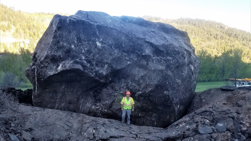 The boulder on the road. Photo: CDOT. A Rockslide, with a boulder of a size of a house, wiped out a section of the highway in SW Colorado.