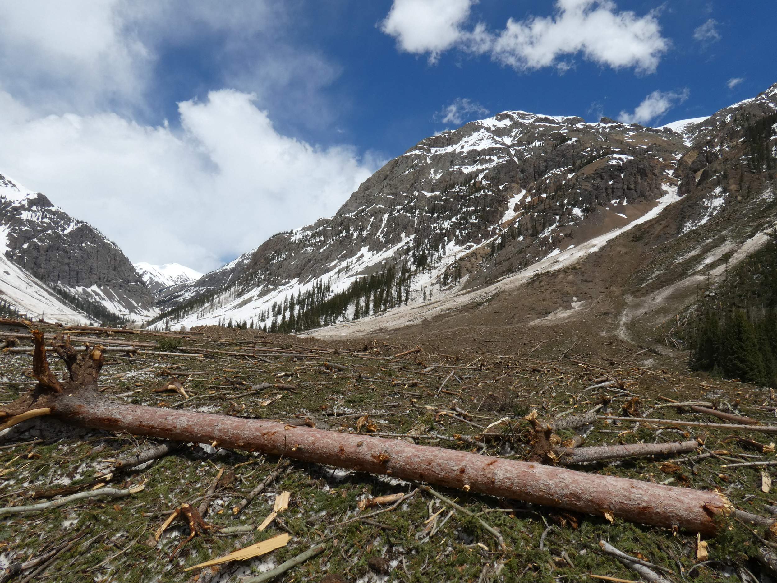 San Juan administration is putting  crews to work cleaning up after the winter avalanches. Photo: Will Tookey. Durango Herald. Due to a year of lots of avalanches, summer operations might be delayed as digging out will take time. 