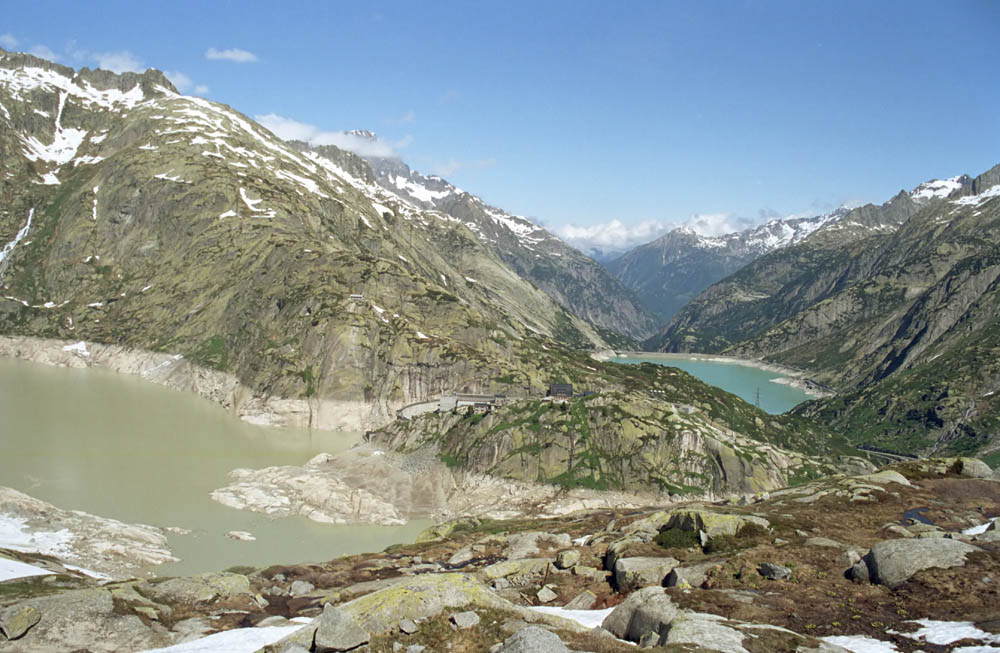 View of the Grimsel Pass and the dam. A drive through the Nufenenpass (Passo della Novena) and Grimsel Pass in Switzerland.