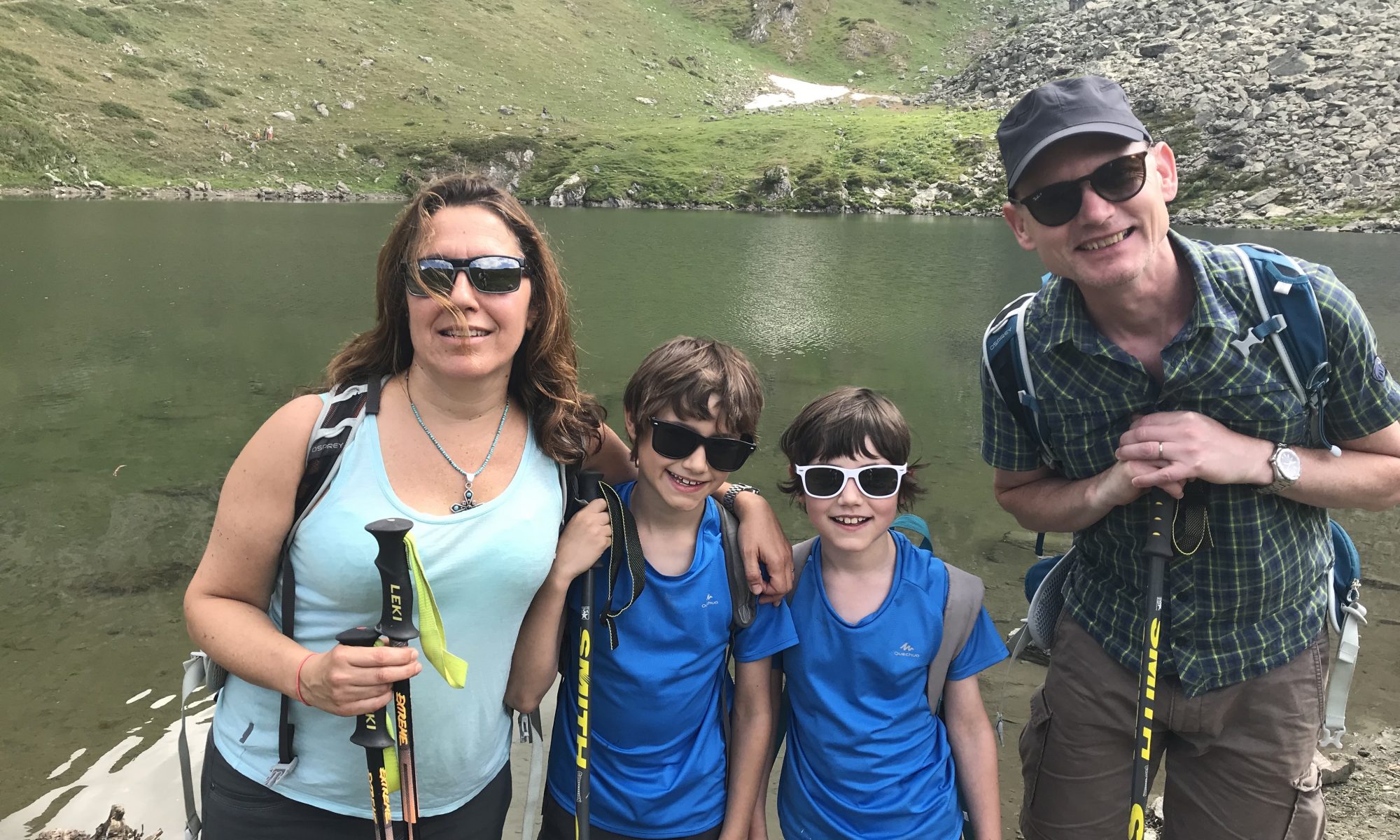 The family by Lago Chamolé in Pila, Aosta Valley. Your shopping guide to mountain hiking apparel and equipment.