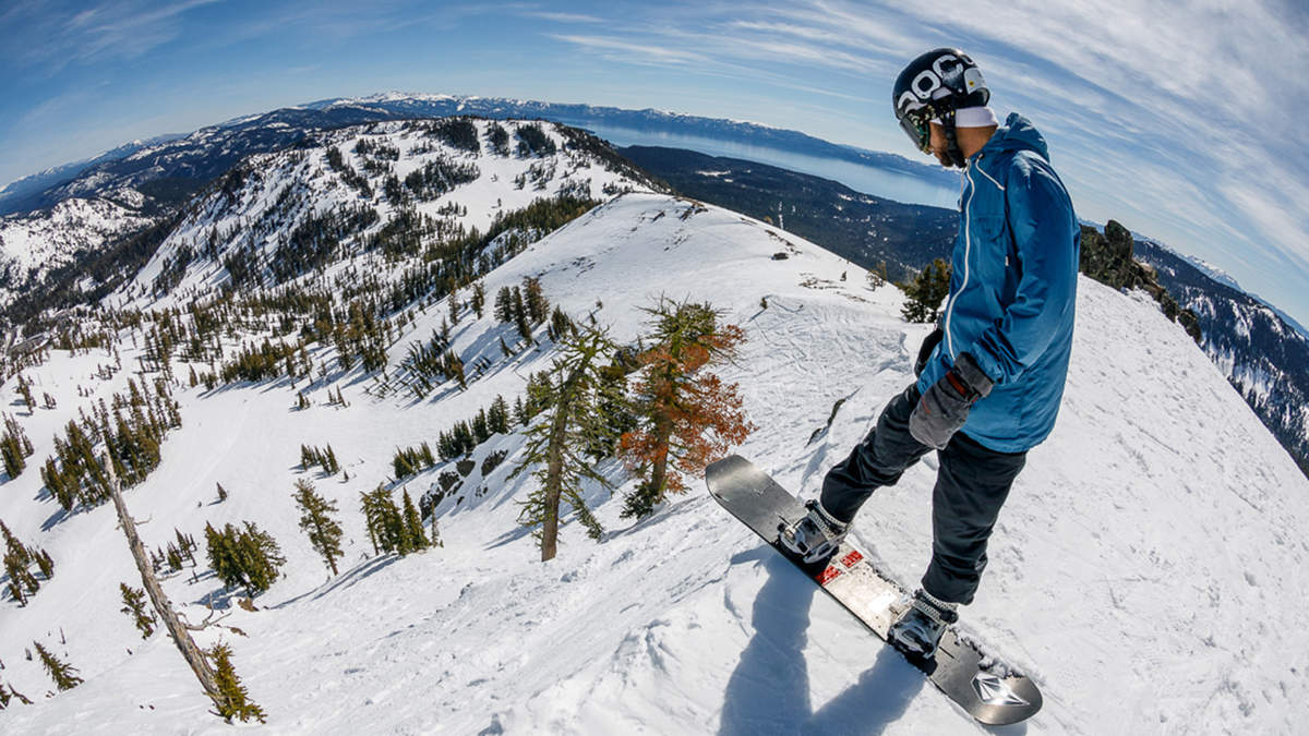 A rider is ready to take the plunge - Squaw Valley photo. Squaw Valley offering $5 passes to ski or ride in June.