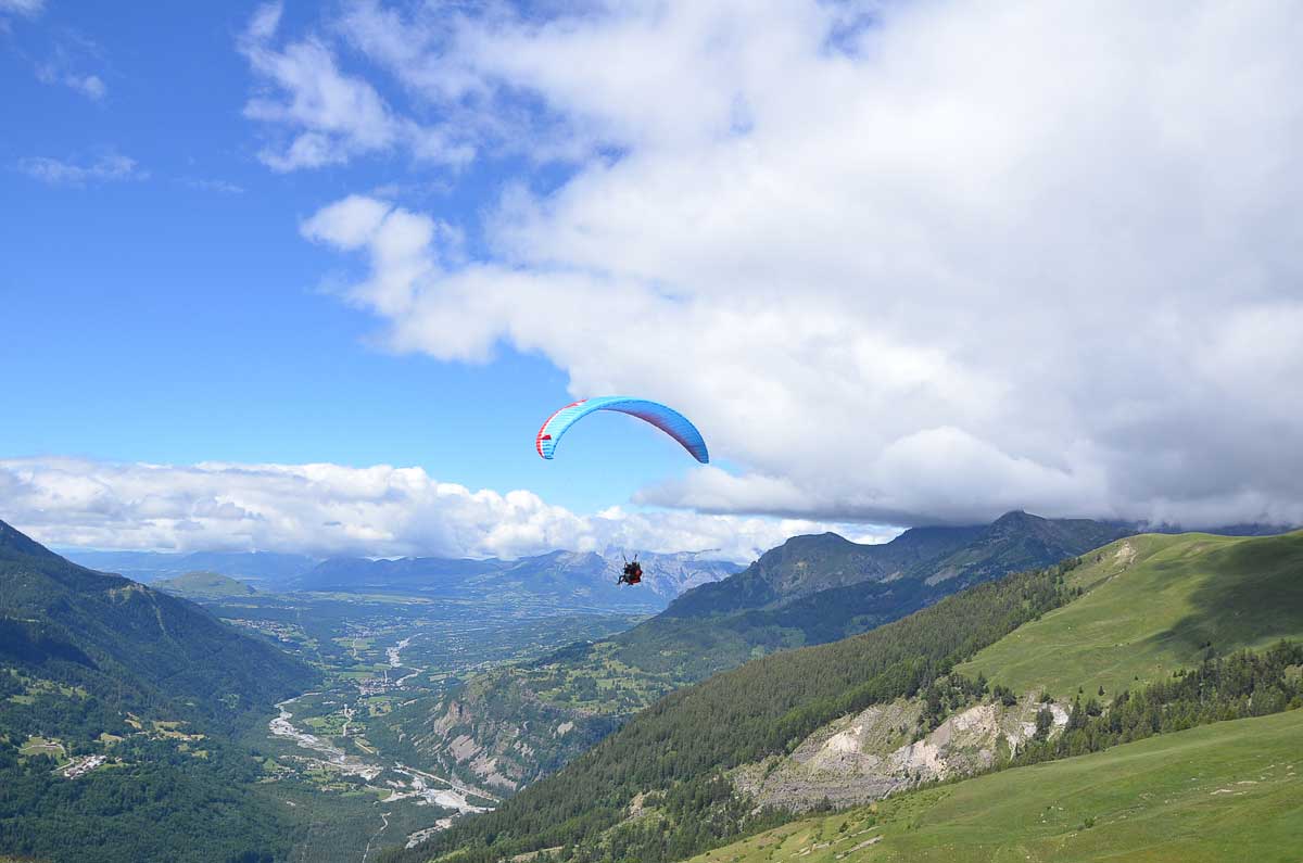 Paragliding in the Alps. Photo: Undiscovered Mountains. The Southern French Alps are the Best Part of the French Alps for Summer Activities.
