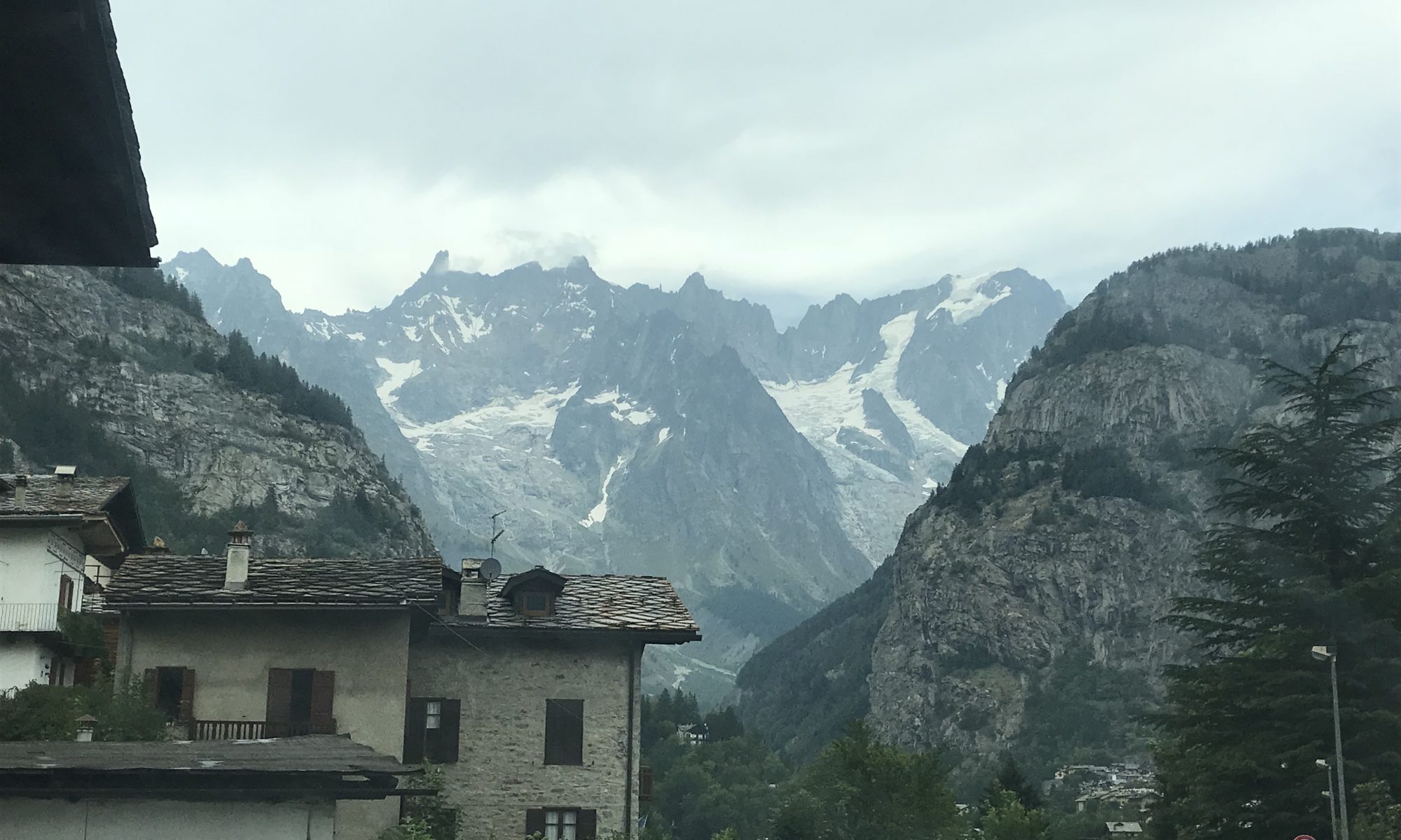 The Rochefort group with the distinctive Dent de Gént viewed from Courmayeur. An ‘ephemeral lake’ appeared on the Mont Blanc massif due to warm record temperatures.