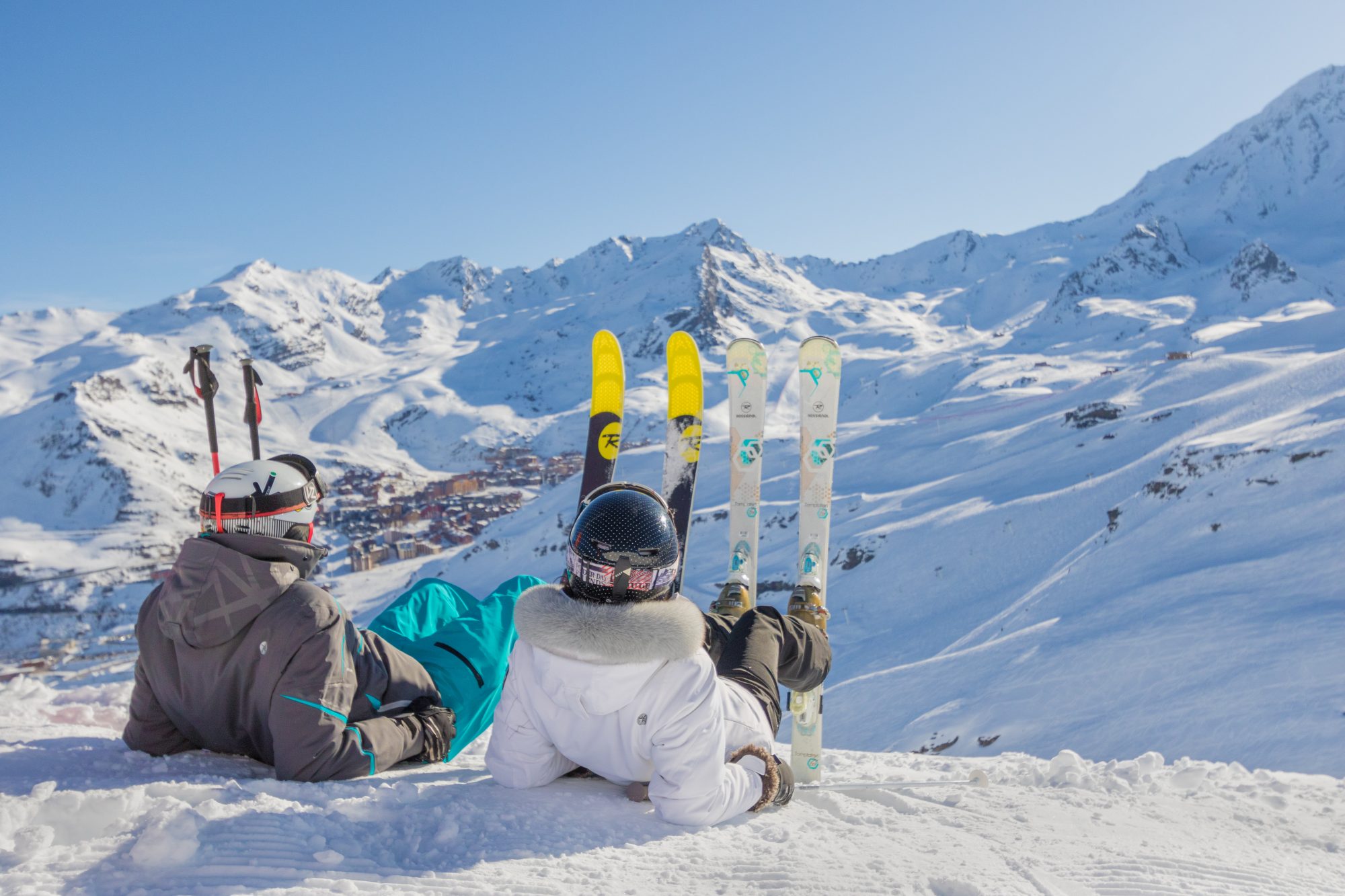 Val Thorens photo. Skiers are laying down to admire the mountains. Photo: C. Cattin OT Val Thorens. So, you want to take your family skiing, but you do not know where to start?
