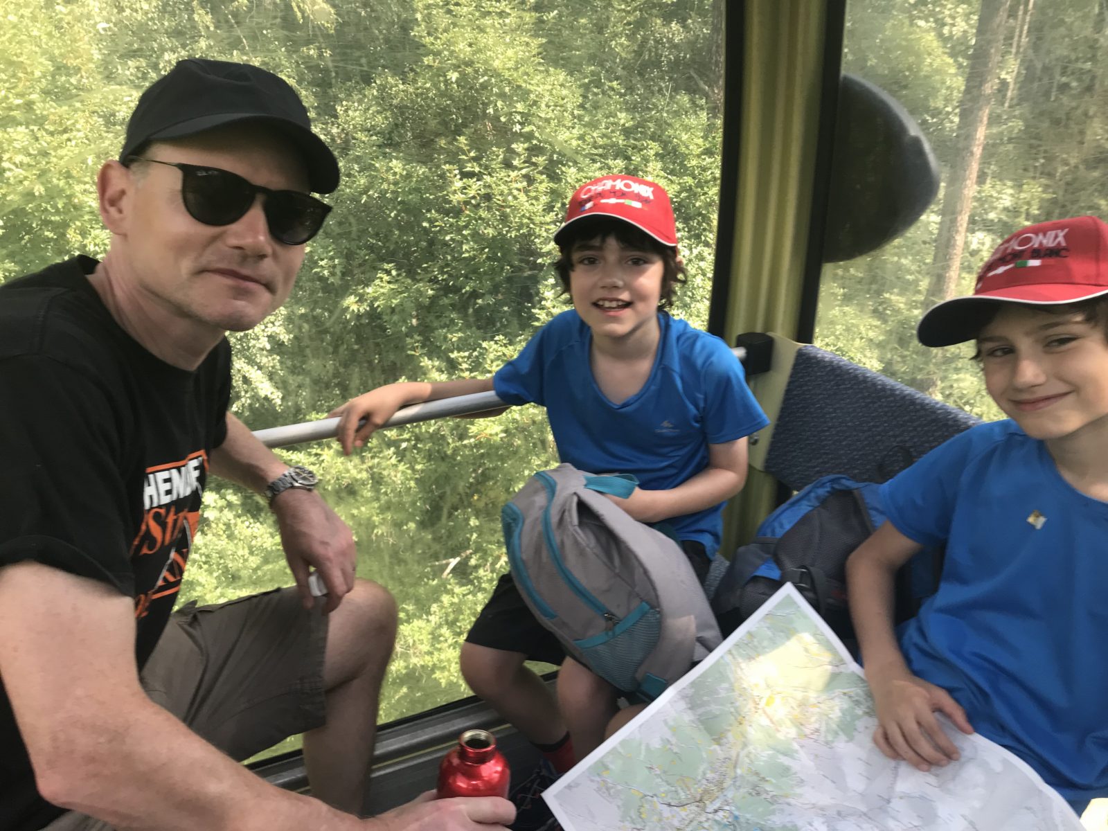 Excited to be going up the mountain. Inside the Dolonne cabinovia. Photo: The-Ski-Guru. Our summer in the mountains – one week in Courmayeur.