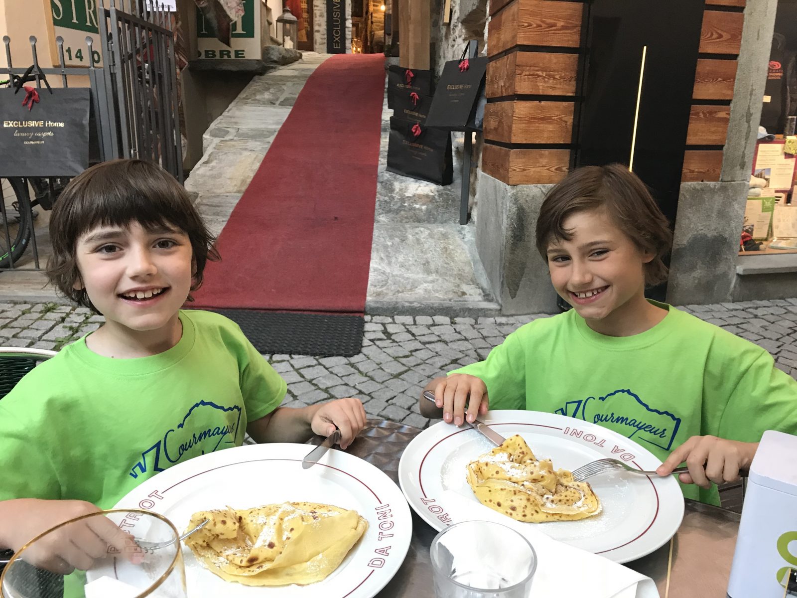 The boys munching their crepes at the Pétit Bistrot Crèperie. Photo: The-Ski-Guru. Our summer in the mountains – one week in Courmayeur.