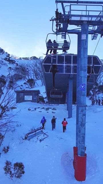 The broken chair is seen on the ground. Skier falls from chairlift in Threbdo after becoming dislodged due to strong winds.