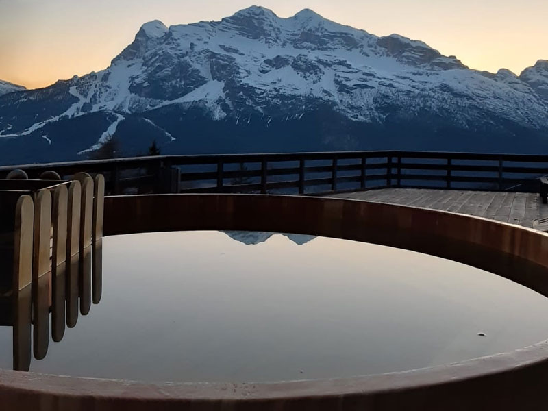 A new wooden outside hot-tub at the Rifugio Mietres. Where to eat in Cortina d' Ampezzo. 