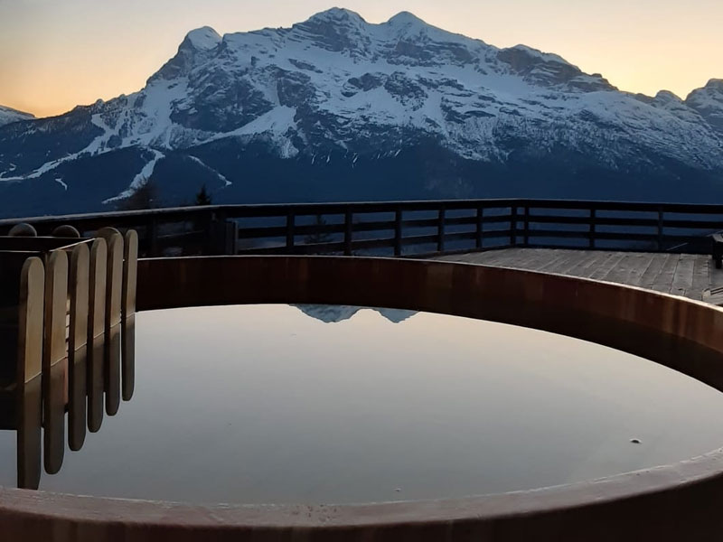 A new wooden outside hot-tub at the Rifugio Mietres. Where to eat in Cortina d' Ampezzo.
