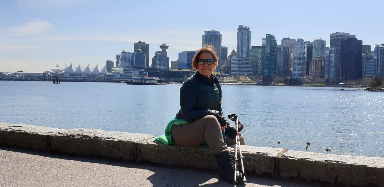 Nordic Walking in Vancouver with the city on the background. Training in the off-season for the ski-season- Nordic Walking.