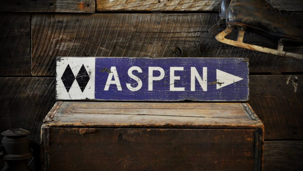 Aspen cabin sign. What to buy to the skier or boarder at heart for Christmas.