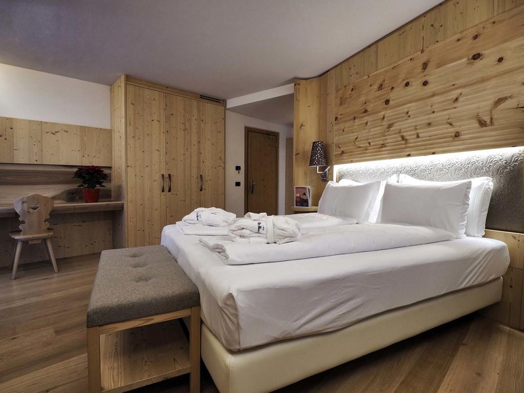 A double room at the Hotel Bertelli in Madonna di Campiglio. The Ski Area Campiglio Dolomiti di Brenta is opening its 2019/20 ski season. News of the resort. 