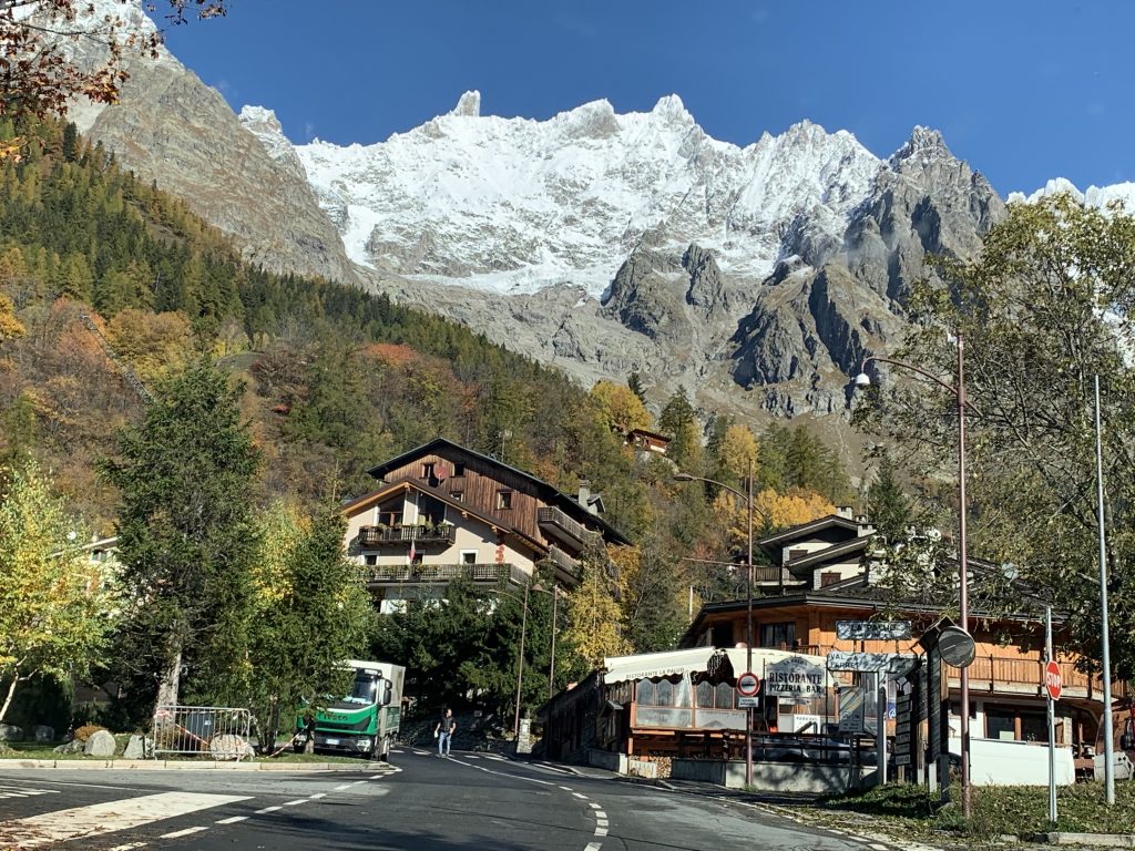 The town of Courmayeur, at the bottom of the Monte Bianco Massif. Skyway Monte Bianco. Courmayeur Mont Blanc announces new sustainability strategy to 'save the glacier'.